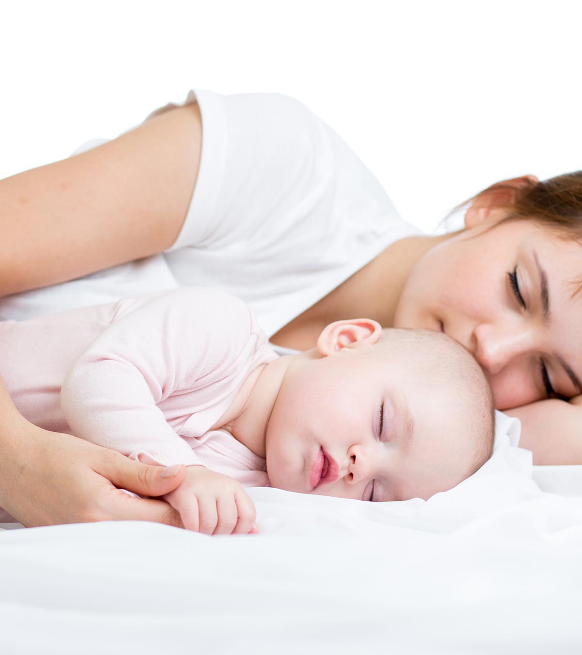 Mother Co-sleeping With Her Baby In Bed