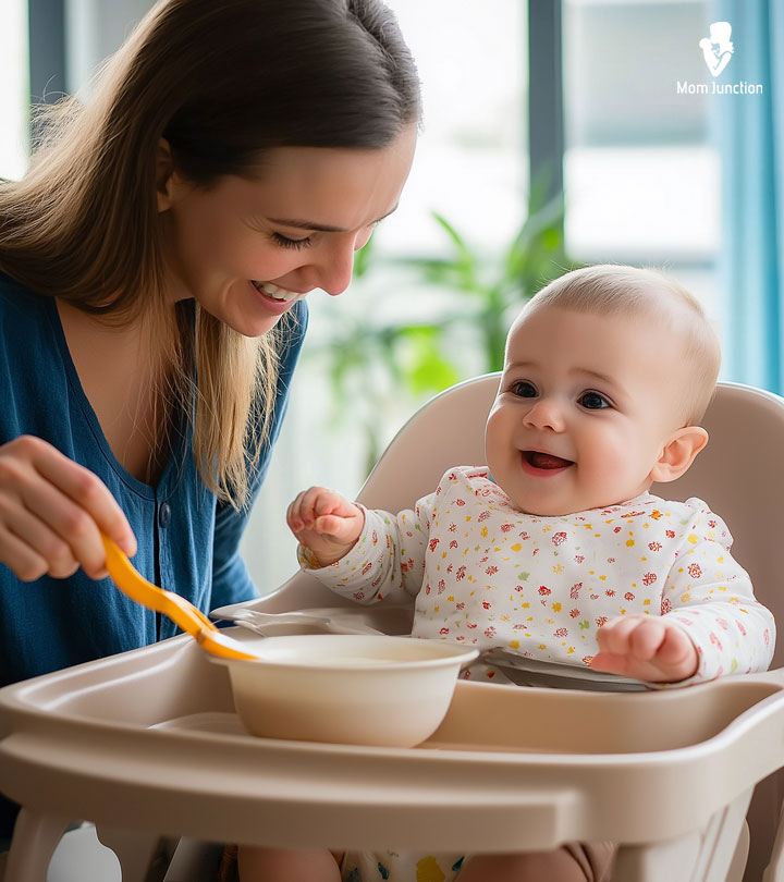 Mother Feeding Cerelac To Baby