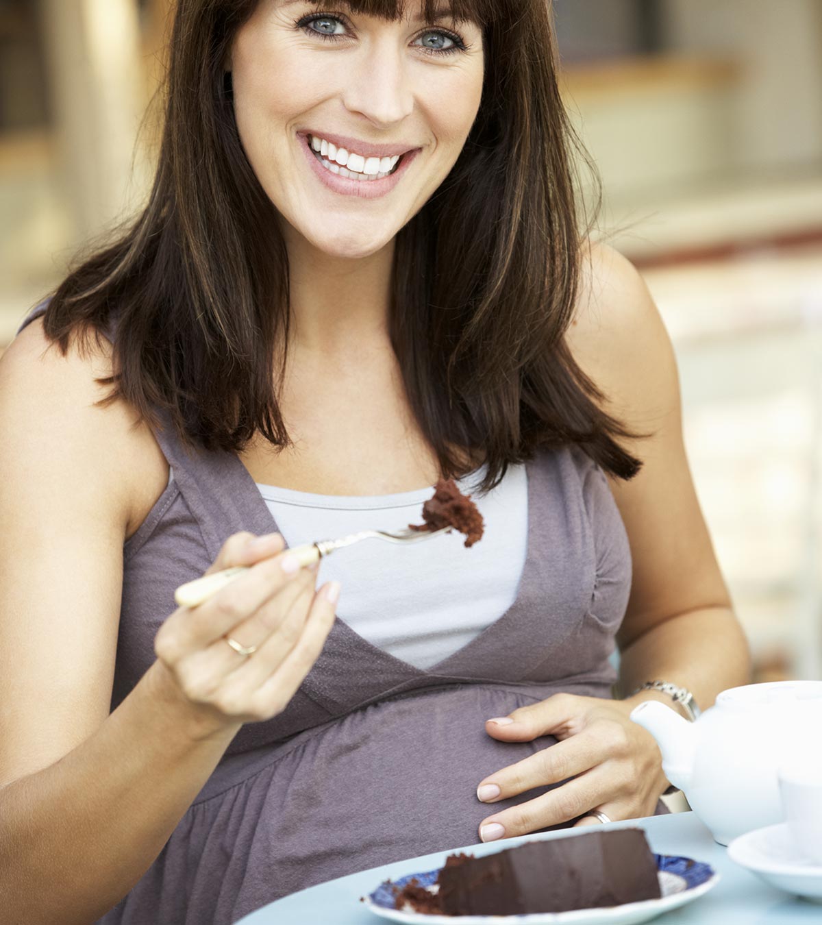 Pregnant Woman Eating Cake