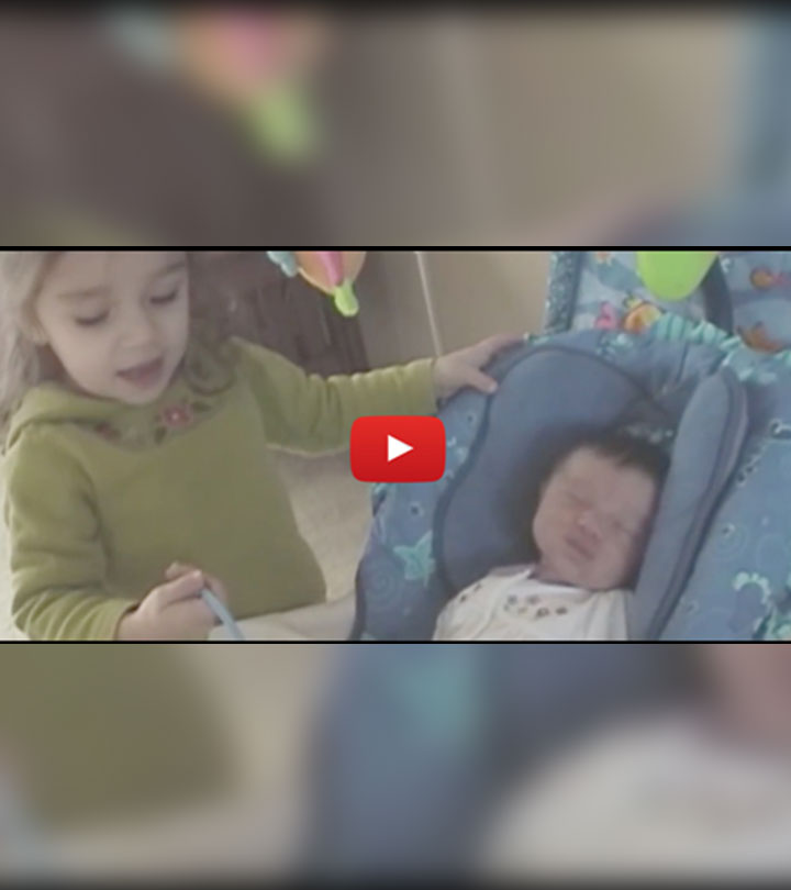 Little Girl Is Worried About Her Newborn Sister