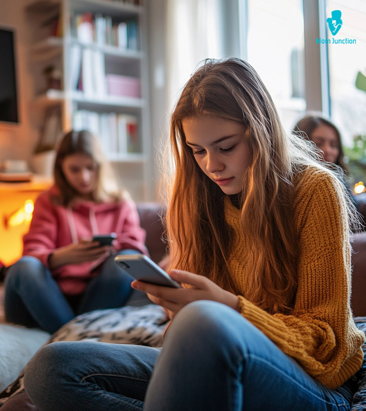 A teenage girl using a mobile phone