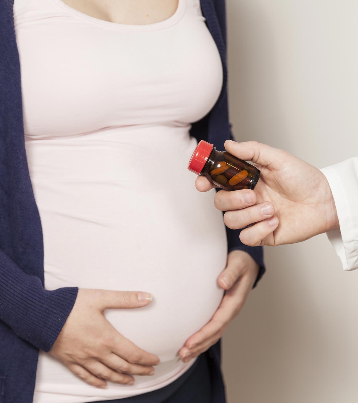 Pregnant Woman Holding Acyclovir Medication