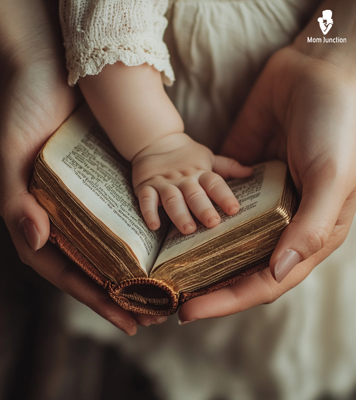 A mother with her baby reading bible verses