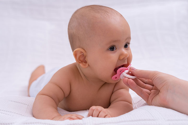 Photo of a pursing lips nine-month-old baby Stock Photo - Alamy