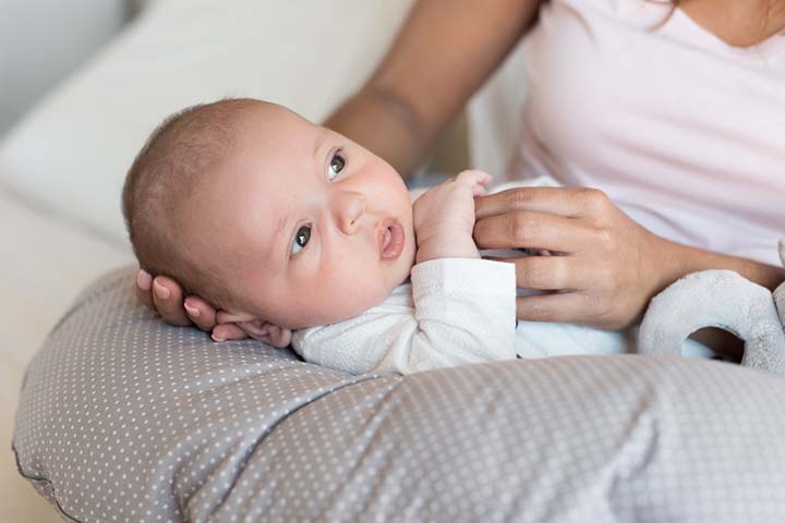 https://www.momjunction.com/wp-content/uploads/2022/10/Use-a-pillow-for-support-during-baby-syringe-feeding.jpg